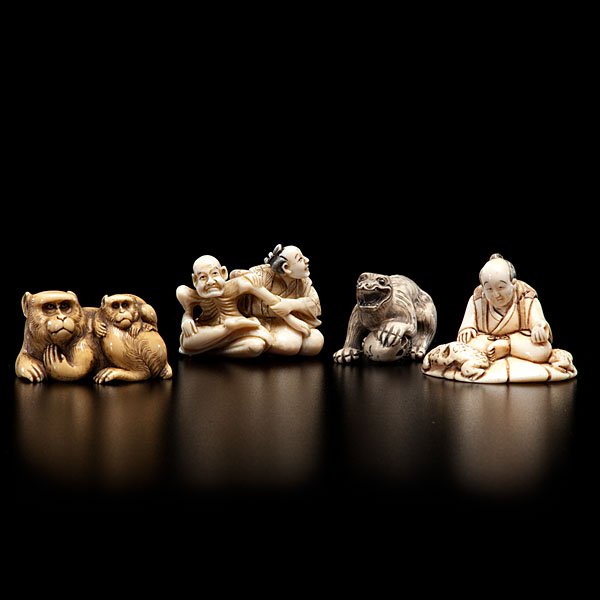 Group of Japanese Ivory Netsuke : Japanese, each early 20th century. A group of four netsuke, one Okimono, a pair of animals and yet another skeleton figure; ht. of tallest 1.75 in.