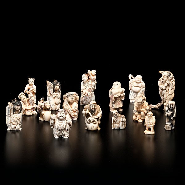Collection of Japanese Carved Figural Netsukes : Japanese, early 20th century. A group of fifteen (15) carved and inked ivory netsuke, 12 with identifying marks; ht. of tallest 2.75 in.
