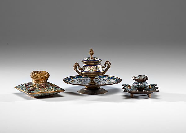 French Champleve Enamel Inkwells : French Champleve Enamel Inkwells French. Three champleve enamel inkwells, one with a two-handled urn-shaped inkwell on a circular stand, one with a scalloped-edge stand, and one of cushion form with