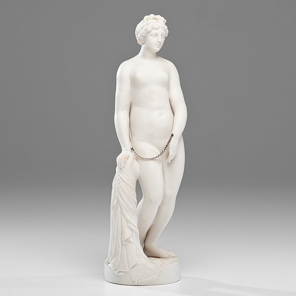 Parian Figure of a Greek Slave after Hiram Powers : Parian Figure of a Greek Slave after Hiram Powers English, ca. 1850. A female Parian figure standing nude next to a draped pillar, her wrists bound by a metal chain, modeled after The Greek Slave by