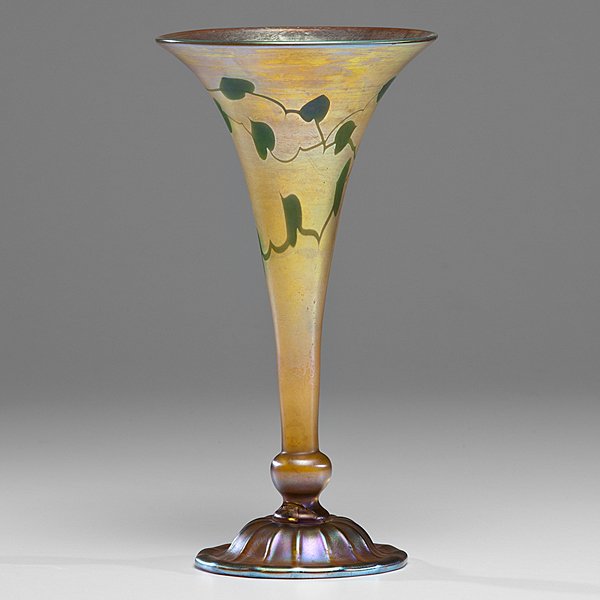 Tiffany Studios Favrille Vase with Ivy : Tiffany Studios Favrille Vase with Ivy American, 1920s. Tiffany Studios favrille vase, decorated with green ivy leaves on climbing vines, the iridescent gold glass has a halo of magenta at the rim a