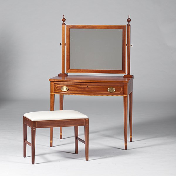 Hepplewhite-style Dressing Table and Stool : Hepplewhite-style Dressing Table and Stool American, 20th century. A mahogany dressing table and vanity stool with satinwood inlay in the Hepplewhite-style, the table having a single large drawer wi