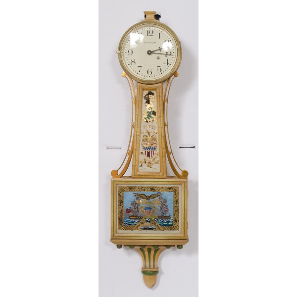 Waltham Hanging Clock : Waltham Hanging Clock British. A miniature banjo clock with the Federal eagle and shield, and a motif of a British and American naval battle; ht. 17 in. Provenance: Former property of the collecti