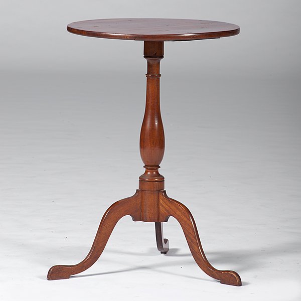 Queen Anne Candlestand : Queen Anne Candlestand American, 18th century. A Queen Anne mahogany candlestand with a round top, a baluster turned support and tripod base; ht. 28, dia. 19.5 in.