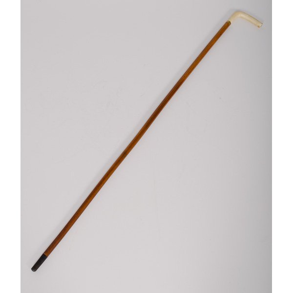 Tiffany & Co. Ivory Handled Cane with Gold Collar : Tiffany & Co. Ivory Handled Cane with Gold Collar Early 20th century. A burl wood cane with gold collar having impressed Tiffany & Co. mark, ivory handle with monogram; lg. 35 in.
