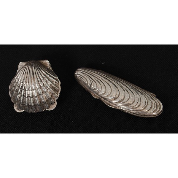 Tiffany & Co. Sterling Pill Boxes : Tiffany & Co. Sterling Pill Boxes New York, late 20th century. Two Tiffany & Co., sterling shell pill boxes, one, oyster shell with Tiffany & Co. marks on inside rim, the other a scallop shell, with
