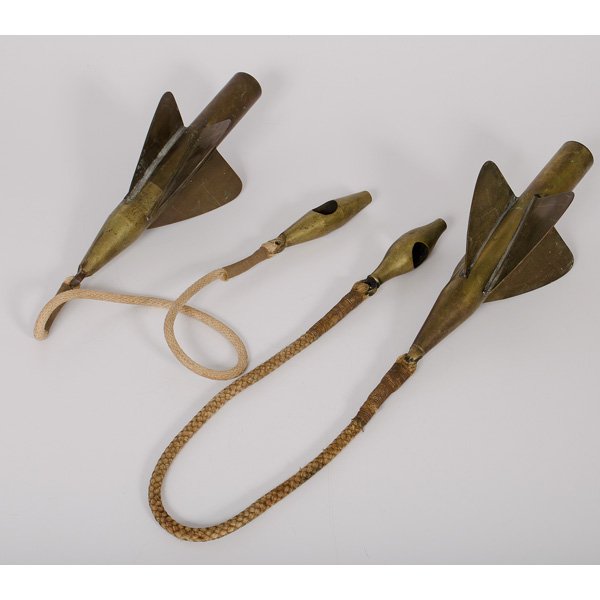 A Pair of Brass Taffrail Logs : A Pair of Brass Taffrail Logs American, 20th century. A pair of brass taffrail logs, marked The Lionel Corporation New York, NY Type TL; lg. of each 48.25 in. (including rope).