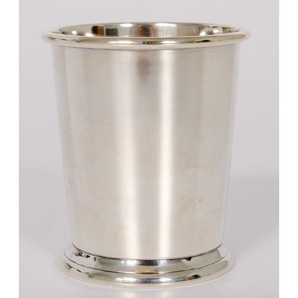 Sterling Julep Cup : Sterling Julep Cup American, 20th century. A sterling silver julep cup with a rolled lip and a banded foot, marked Sterling and 0040, but no maker's mark; ht. 4 in., silver wt. 4ozt, (151gm).