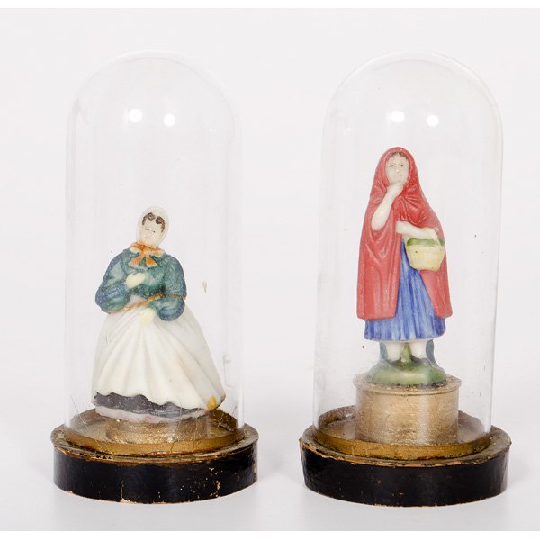 Painted Wax Figures Under Glass Domes : Painted Wax Figures Under Glass Domes Continental, 19th century. A pair of hand-painted wax figures, one depicting a female wearing a red cloak and carrying a basket under her arm, the other showing