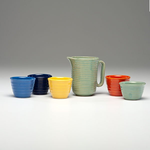 Bauer Pottery Ringware Cups and Pitcher : Bauer Pottery Ringware Cups and Pitcher Set of five Ringware cups in jade, orange, yellow, delph blue and cobalt, PLUS jade pitcher Cups: ht. 2.5, dia. 3.5 in. Pitcher: ht. 5, dia. 4 in.