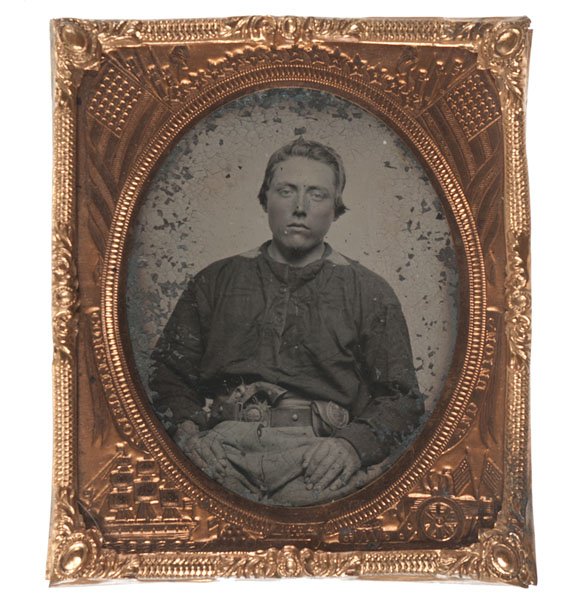 Sixth Plate Tintype of an Armed Confederate : Sixth Plate Tintype of an Armed Confederate Sixth plate tintype of a soldier with a sober expression, his cheeks lightly tinted pink, wearing a CS belt plate as well as a cap box with an indistingui