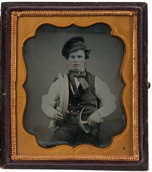 Occupational Sixth Plate Ambrotype of a Young Cooper: Occupational Sixth Plate Ambrotype of a Young Cooper with his Tools Seated, three-quarter-length portrait of a young barrel maker with wood bands over one shoulder and holding a cooper's hammer in t