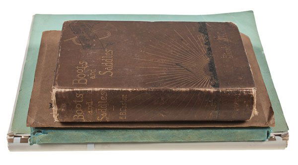 Custer Family Genealogies & Related Materials, Plus a: Custer Family Genealogies & Related Materials, Plus a Family Copy of Boots & Saddles Lot of 4 books and 35+ documents/ photocopied papers related to the Custer family and its genealogy. The book