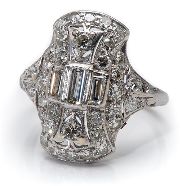 Ladies Platinum Art Deco Diamond Ring : Ladies Platinum Art Deco Diamond Ring Ladies 5% iridium platinum art deco fashion ring containing one VS1, G color 5.5mm x 3mm baguette diamond weighing approximately .25 carats, two VS1, G-H color 