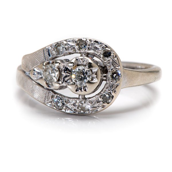 Ladies 14 Karat White Gold Diamond Ring : Ladies 14 Karat White Gold Diamond Ring Ladies vintage 14k white gold ring containing 7 SI1-SI2, G color single cut diamonds weighing approximately .14 carats total weight and two SI1-SI2, G-H color