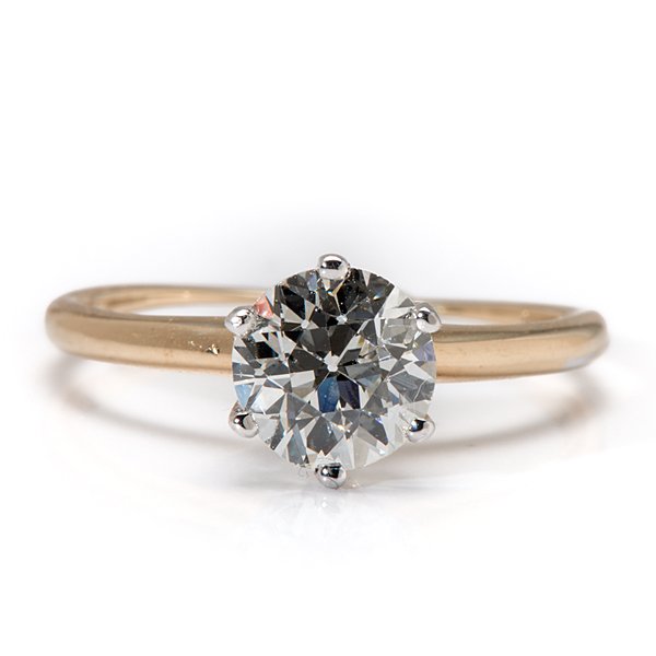 Ladies 1.25 Carat Diamond Solitaire : Ladies 1.25 Carat Diamond Solitaire Ladies 14 karat two-tone round base six-prong solitaire containing one VVS2-VS1, H-I color European cut diamond measuring 6.7mm x 6.7mm x 4.275mm and weighing 1.2