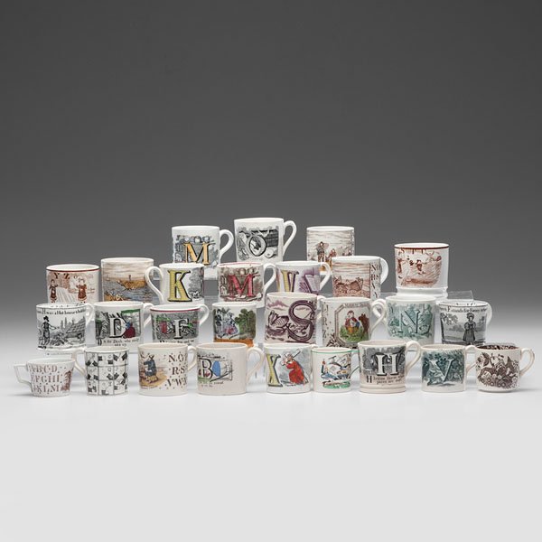 English Alphabet Transferware Canns and Cups : English Alphabet Transferware Canns and Cups English, 19th century. An assembled group of twenty-seven transferware canns and cups, twenty four of them with alphabet motifs and three with assorted s
