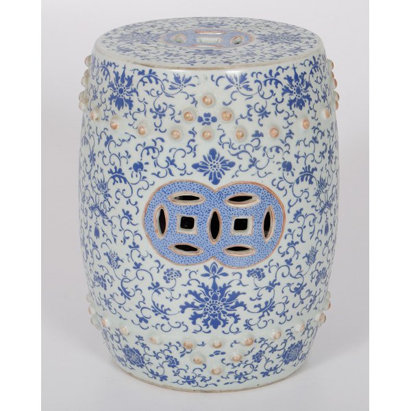Chinese Porcelain Garden Seat : Chinese Porcelain Garden Seat Chinese, 20th century. A porcelain garden seat with two bands of applied bosses, the drum-form body with pierced medallions on the sides and top, the whole with blue fl