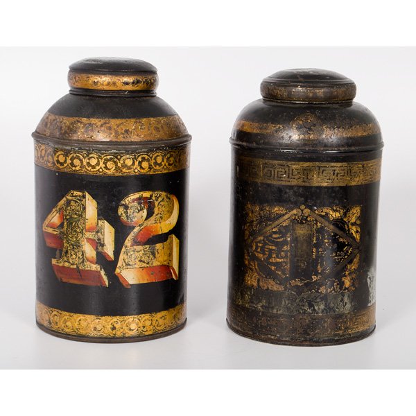 Tole Painted Tea Canisters : Tole Painted Tea Canisters Late 19th-early 20th century. A pair of tole painted tea canisters of cylindrical form, having bands of stylized gilt decoration around the covers, shoulders, and sides, a