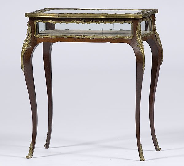 Louis XV-style Glass Vitrine : Louis XV-style Glass Vitrine 20th century. A Louis XV-style glass vitrine in wood with ormolu mounts and brass trim, case having glass on four sides and in the lift-top, on cabriole legs; ht. 30, wd
