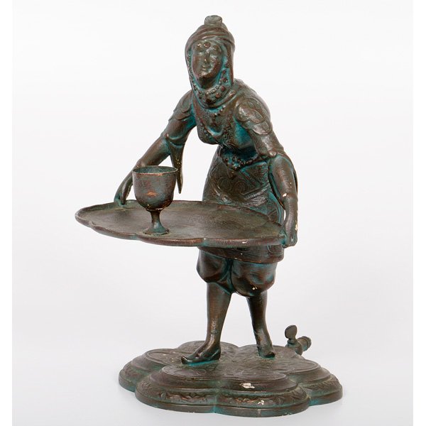 Newel Post Cast Metal Figure : Newel Post Cast Metal Figure Continental, 19th century. A gasolier cast metal figure of a middle eastern woman carrying a tray with a cup; ht. 15.5 in.