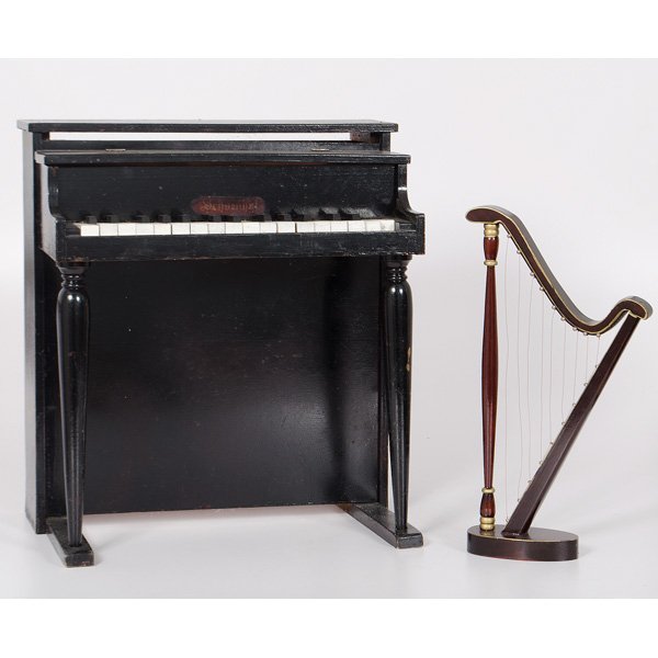 Child's Schoenhut Piano, Plus : Child's Schoenhut Piano, Plus German, 20th century. A child's Schoenhut 30 key piano. Lot also includes a child's wooden harp; piano ht. 22, lg.19, dp. 13.25 in. Provenance: Property from the 