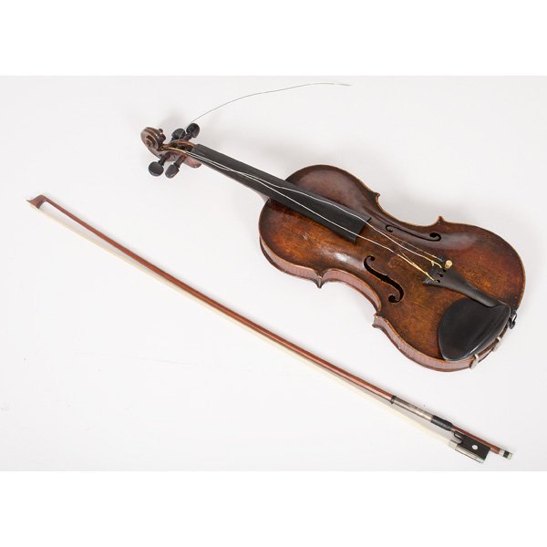 Violin with Anton Wasslberger Label : Violin with Anton Wasslberger Label Continental. A violin retaining an interior inked label reading Anton Wasslberger / Geigenmacher zu / Hallein. 1722., accompanied by a bow, case, and extra string