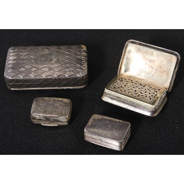 English Sterling Vinaigrettes : English Sterling Vinaigrettes English, 19th century. An assembled group of four sterling silver vinaigrettes, with various marks, some obscured, and marked for English sterling; largest lg. 2.25 in.