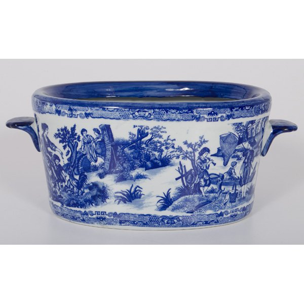 Victoria Ware Ironstone Footbath : Victoria Ware Ironstone Footbath English, 20th century. A blue and white transferware ironstone footbath of oval form with two handles, decorated with figures in a landscape, marked Victoria Ware / 