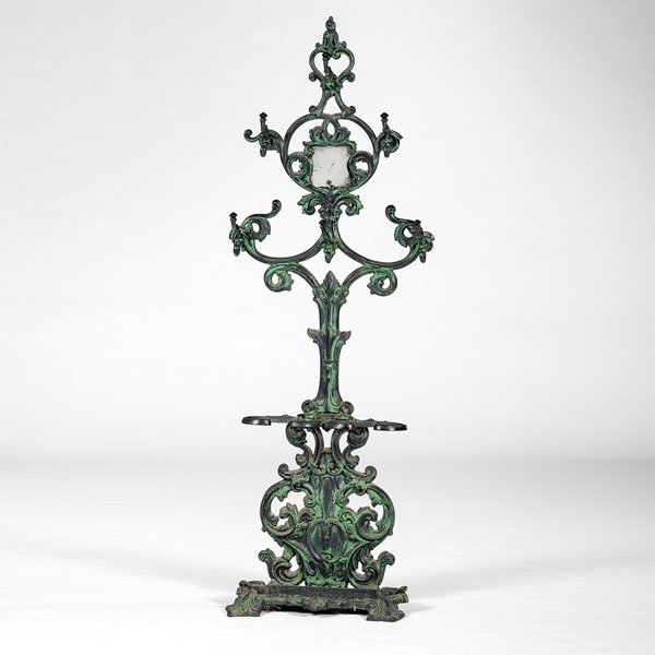 Rococo Revival Cast Iron Hall Tree : Rococo Revival Cast Iron Hall Tree American, mid-19th century. A Rococo Revival cast iron hall tree, with scrolled foliate back with hooks, the shell and acanthus leave base with umbrella drip-pan, 