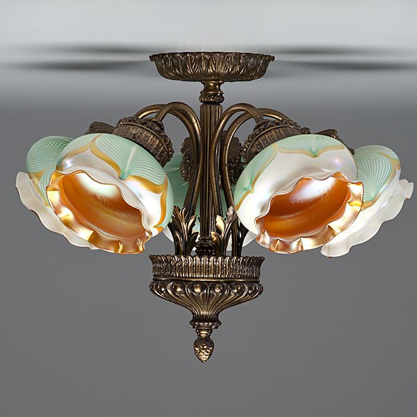 Light Fixture with Quezal Pulled Feather Shades : Light Fixture with Quezal Pulled Feather Shades American, 20th century. A metal ceiling light fixture with five arms, having Quezal green pulled feather shades with gold interior (lot includes s