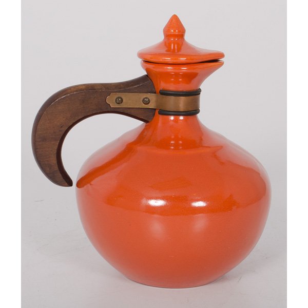 Bauer Coffee Carafe : Bauer Coffee Carafe A Bauer Pottery coffee carafe in Bauer orange. With lid and wood and copper handle; ht. approx. 9.5 in.