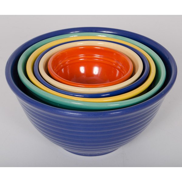 Bauer Pottery Bowls : Bauer Pottery Bowls American, 20th century. A group of six Bauer pottery ringware bowls. Bowls stack inside each other and come in colors of blue, turquoise, yellow, light yellow and orange; largest