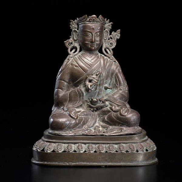 Bronze Seated Second Buddha : Bronze Seated Second Buddha Nepalese, 19th century. A bronze Second Buddha, also known as Padmasambhava, or Guru Rinpoche, crowned, and seated on a detachable lotus base. The Guru holds a Vajra (ri