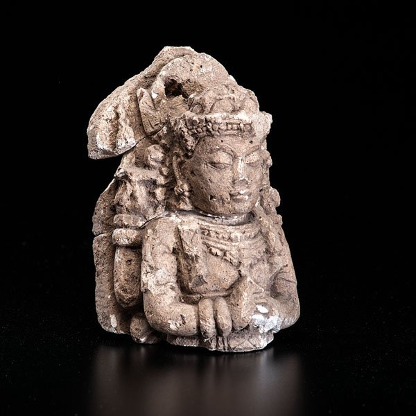 Female Deity Stone Carving : Female Deity Stone Carving Indonesian, 14th century. A fragment of stone sculpture of female deity from archeological site Trowulan Village, Mojopahit, Java. The fragment shows the deity's crowned h