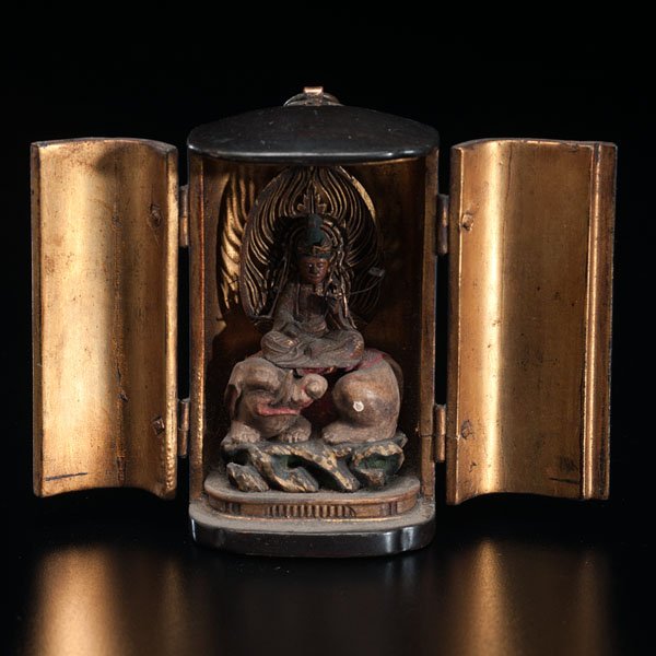 Miniature Portable House Shrine : Miniature Portable House Shrine Chinese, 17th-19th century. Miniature portable house shrine made out of carved lacquer wood, metal and gold leaf. The deity is sitting on lotus throne, poised on the 