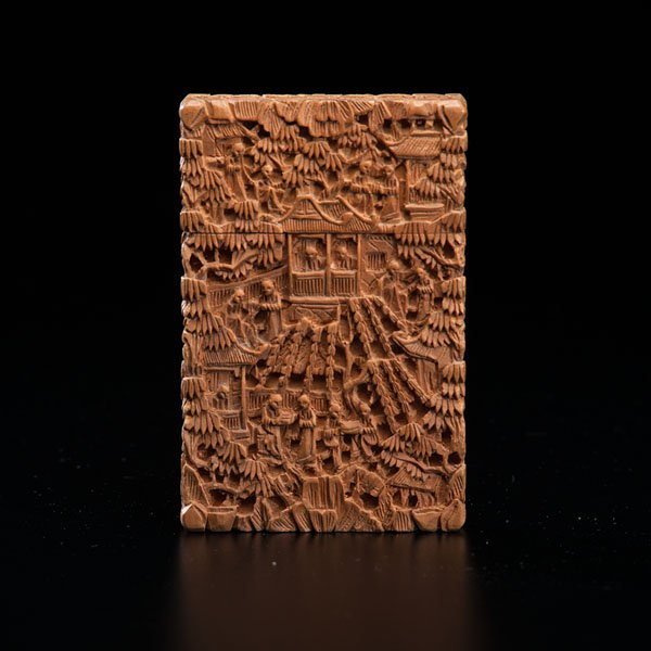 Sandlewood Calling Card Case : Sandlewood Calling Card Case Chinese, late 19th century. A carved sandlewood calling card case. The carving depicts a village scene with human figures and houses. 2.75 x 4.25 in. Provenance: Prope