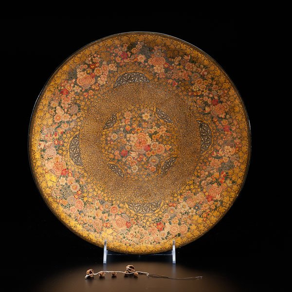 Decorative Flat Bowl and Chain of Miniature Baskets : Decorative Flat Bowl and Chain of Miniature Baskets India, 19th century. One papier mache, lacquered flat bowl, with an intricate gold and red floral design on a black ground. 15.5 in. One group of 