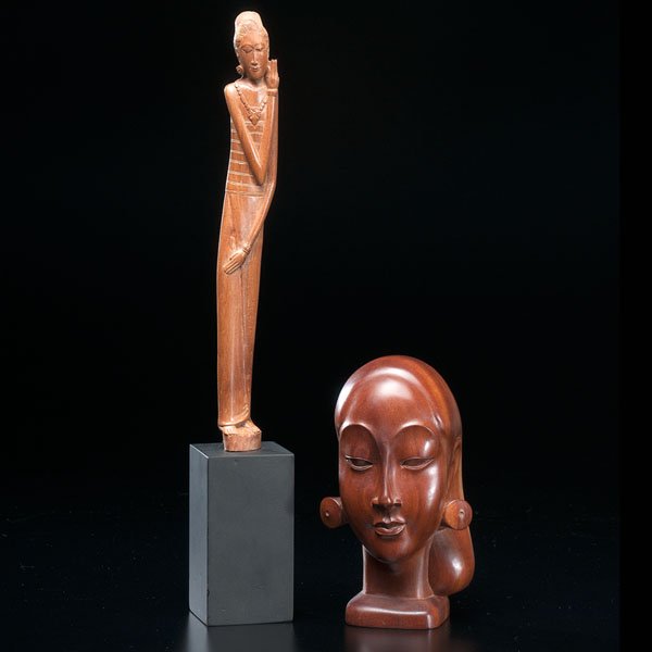 Two Wood Sculptures of Women : Two Wood Sculptures of Women India, Indonesia, 20th century. Two carved polished wood sculpture; one is a sculpture of an Indonesian woman's head with earplugs, by artist Bangli Lo. Ht. 7 in. The ot