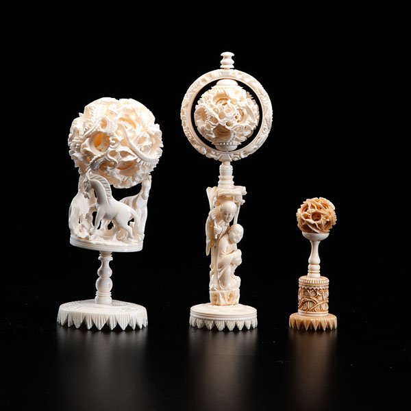 A Collection of Chinese Ivory Puzzle Balls : A Collection of Chinese Ivory Puzzle Balls 19th century. A group of three Chinese carved ivory puzzle balls, including a pair of six-layer balls on stands, and one smaller five-ball stained carvin