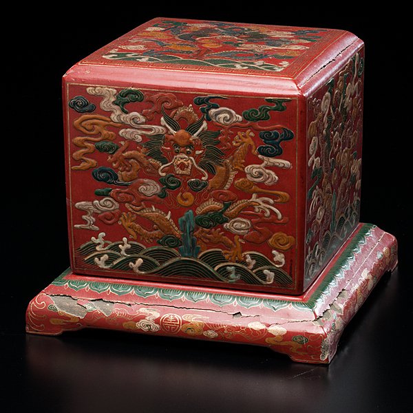 Chinese Lacquer Seal Box : Chinese Lacquer Seal Box Chinese, 20th century. A lacquer seal box with cover, the exterior having a five-clawed dragon on each side chasing a fiery pearl surrounded by wispy clouds and over stormy