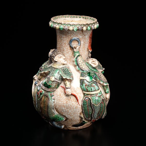 Chinese 19th Century Ironstone Relief Vase : Chinese 19th Century Ironstone Relief Vase Chinese, 19th century. An ironstone vase with warriors in relief. Marked on underside; ht. 11 in.