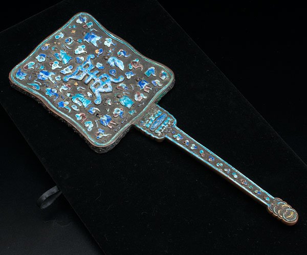 Chinese Repoussé Enameled Mirror : Chinese Repoussé Enameled Mirror Chinese. A repoussé enameled hand-held mirror, the back decorated with colorful geometric, floral, and figural motifs surrounding a central Chinese character, the