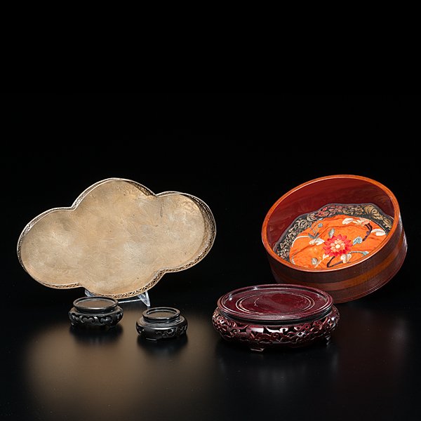 Chinese Display Stands and Bowl : Chinese Display Stands and Bowl Chinese. An assembled group of four display stands, three carved wood and one brass, as well as a wood bowl with embroidered insert. Dia. 7.5 in. (bowl).