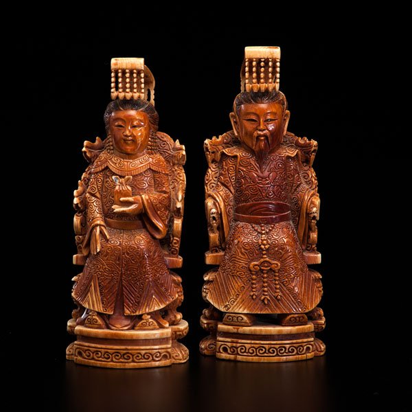 Chinese Carved Ivory Imperial Figures : Chinese Carved Ivory Imperial Figures Chinese, late 19th century. A pair of carved ivory imperial figures, seated on ornately carved dragon thrones. Two-character marks on the underside; ht. 6.75 in