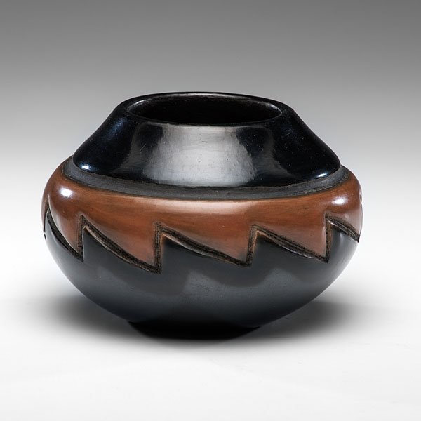 Rose (ca.1900-1989) and TsePe (b. 1940) Gonzales San: Rose (ca.1900-1989) and TsePe (b. 1940) Gonzales San Ildefonso Black and Sienna Bowl bowl designed with a carved band with lower edge serrated; band with sienna finish; signed by both Rose and TsePe