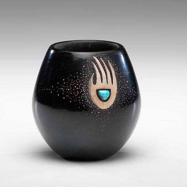 TsePe Gonzales (San Ildefonso, b. 1940) and Dora TsePe: TsePe Gonzales (San Ildefonso, b. 1940) and Dora TsePe (Tewa, b.1939) Blackware Bowl blackware bowl decorated with a silver bear paw set with a small turquoise stone; bear paw is surrounded by a sp