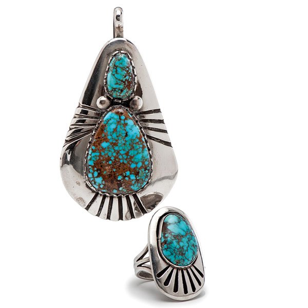 Julian Lovato (Santo Domingo, b. 1922) Silver and: Julian Lovato (Santo Domingo, b. 1922) Silver and Turquoise Pendant and Ring lot of 2, including a teardrop shaped pendant set with two blue with copper matrix turquoise cabochons; hallmark on rever