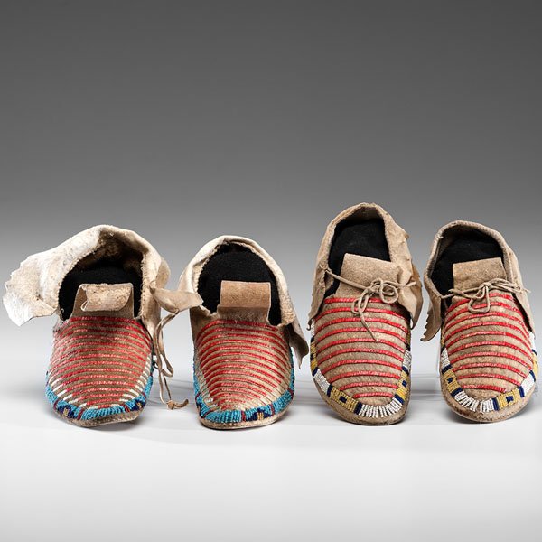 Sioux Child's Beaded and Quilled Moccasins : Sioux Child's Beaded and Quilled Moccasins lot of 2, both thread and sinew-sewn and similarly designed with thin bands of red quillwork striping vamps; a lane of beadwork outlines soles and cuffs h