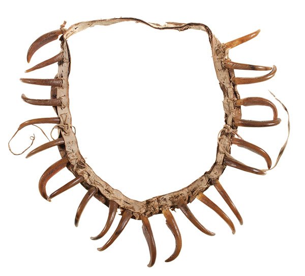 Prairie Imitation Bear Claw Necklace : Prairie Imitation Bear Claw Necklace composed of 23 horse hooves carved into bear claws and attached to hide strap, average length of "claw" 3.25 in. fourth quarter 19th century